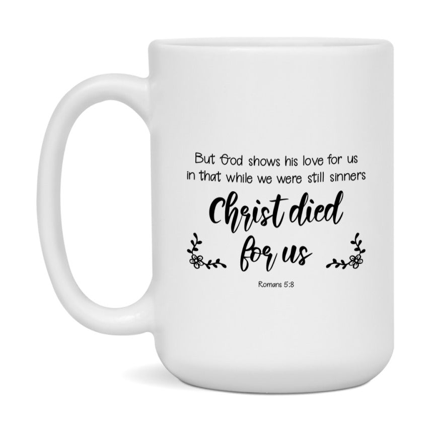 But God Shows His Love For Us In That While We Were Still Sinners Christ Died For Us Mug